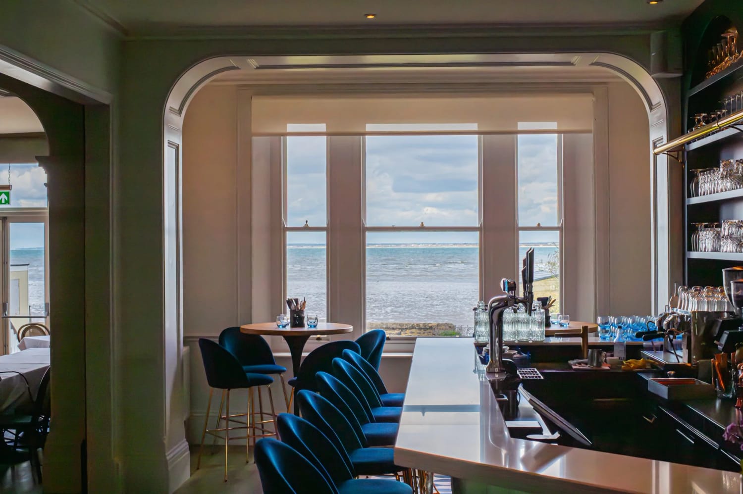 The bar at RT Café Grill, the wide windows and the Solent beyond