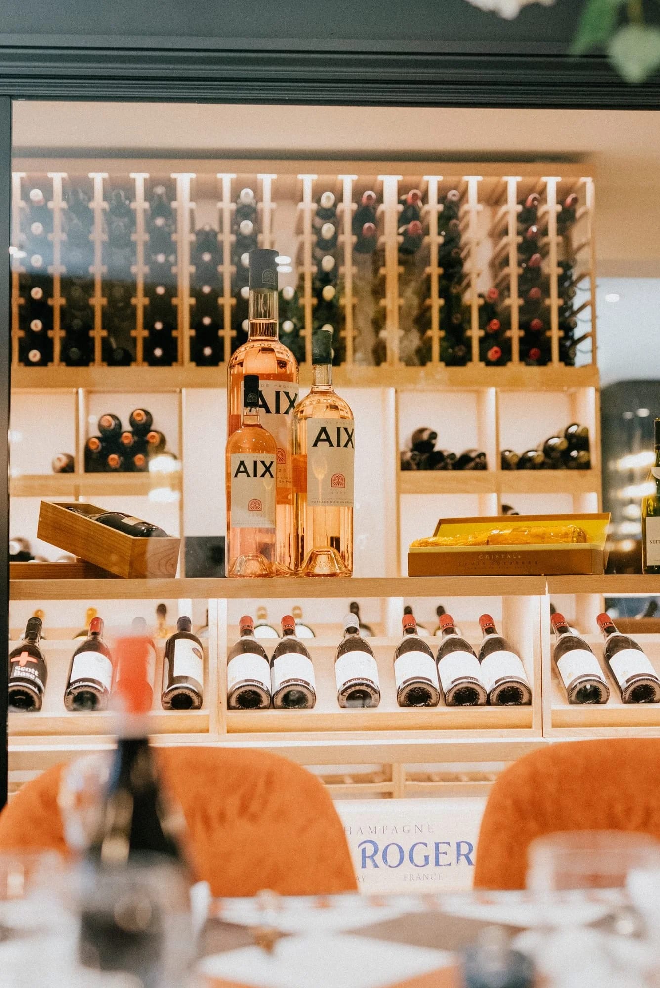 The wine room at Royal Maritime House seen through glass