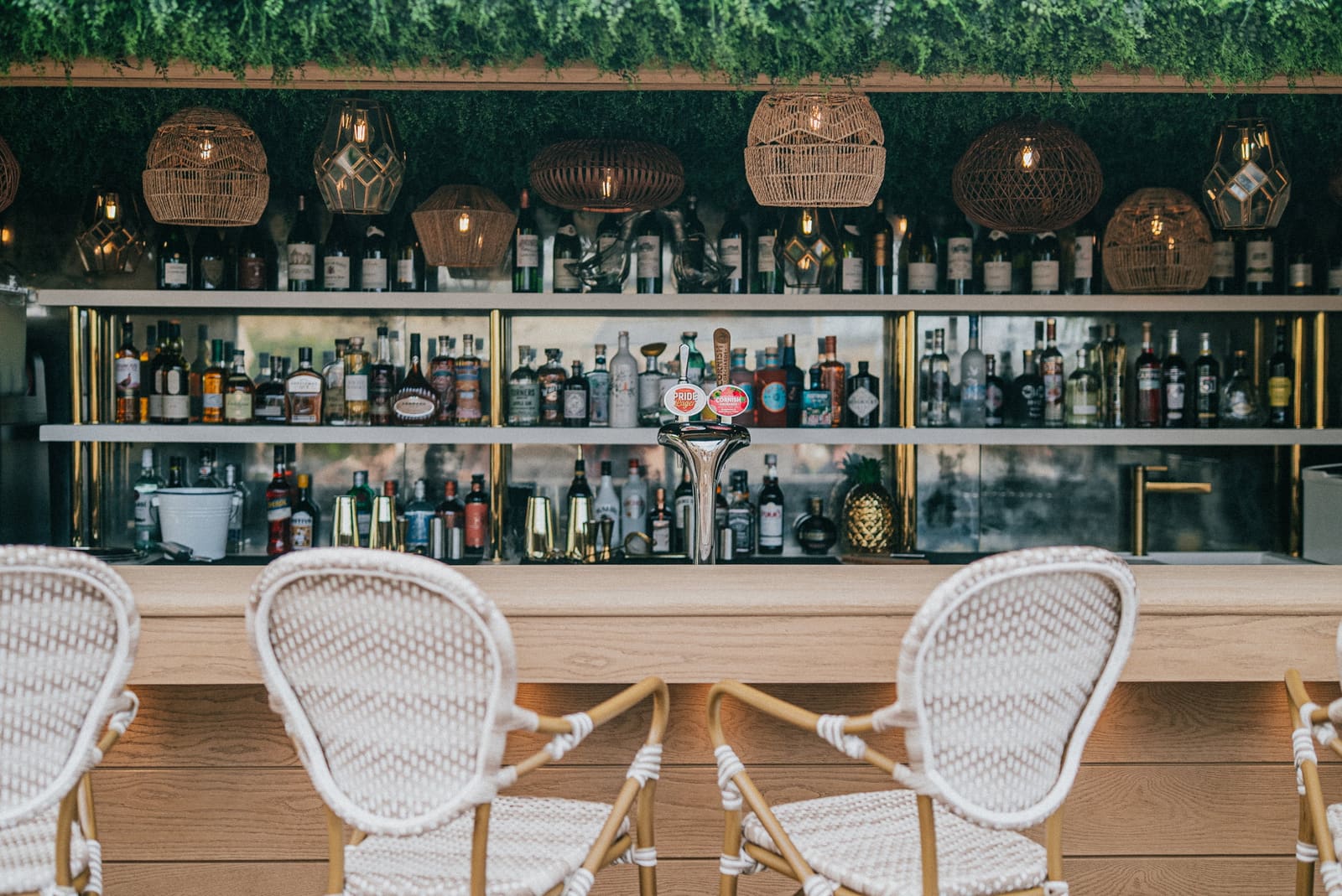 The garden bar under its rattan lanterns