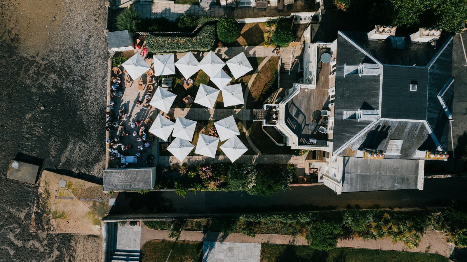 The house, garden and terrace straight from above, the sand alongside